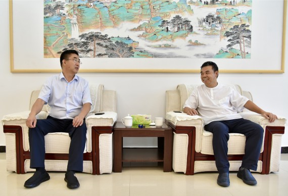 朱志骞会见广东永亮集团董事长佘永亮一行 (2)_副本.jpg